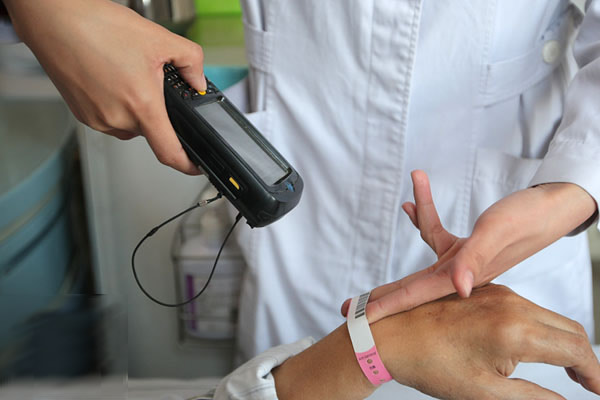 The Application of RFID Wristband in School & Hospital